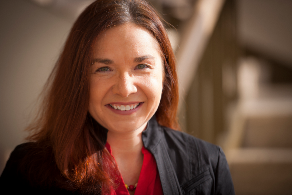 Katharine Hayhoe smiling looking into the camera